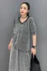 Jupes à deux pièces en jupe grise pour les femmes décontractées perd des t-shirts une ligne élégante kit de vêtements de fête de correspondance de couleur unie élégante