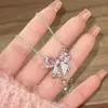Подвесные ожерелья Корея Новый дизайн Bowknot Розовый циркон кросс -подвесные ожерелья мода темперамент цепочка для женщин Модные ювелирные украшения