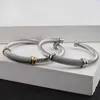 Wholesale of European and American stainless steel mesh woven C-shaped open bracelets for women's 18K gold jewelry 5mm steel wire bracelets