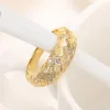 Band Huitan Engagement Wedding Rings Nytt för kvinnor chic Braid design lyxguld färg kvinnliga ringar parti uttalande smycken droppfartyg