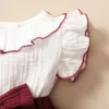 Robes de fille bébé fille rouge fille avec une robe de cupcake blanche à 3 couches d240425