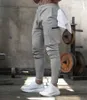 سراويل الرجال الرجال sweatpant سراويل متعددة الجيب السراويل في الكاحل السوستة للرجال الركض غير الرسمي الخريف رجال أسنانات السراويل D240425