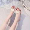 Pantofole 2024 Summer Fashion Oscita da donna Outwear Round Toe Open Flower Water Diamond Style Teli alti comodi