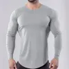 Tシャツの男性長袖TシャツフィットネスアウトドアスポーツランニングコットンタイトフィッティングシャツボディービルマッスルジムTtraining圧縮