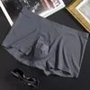 L-xxxl naadloze ijs zijden boksers mannen massieve kleur mannelijke onderbroek ultradunne sexy ondergoed zomer coole kofferbak shorts 240425