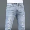 Luxe zomerontwerper Koreaanse klassieke streetwear cowboybroek voor mannen modieuze en comfortabele vriendje skinny jeans 240417