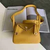 Sac de créateur Ldy L Définition Lindi High Bag Mini Mini Head Couche Togo Cuir One épaule Messenger Sac pour femmes Doctor Sac et Sac Straddle