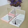 Spiegels mini-ledlichten ijdelheid spiegel opvouwbare verlichte make-up spiegel dubbelzijdige cosmetische hand vouwen draagbare compacte pocket spiegel
