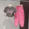 Ensemble de vêtements pour jeunes et filles Ensemble de vêtements 2023 Été Nouvelle fille Baby Baby Short à manches et pantalons deux pièces Q240425