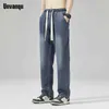 メンズジーンズUnvanqu Harajuku Street Simple Elastic Waist Wide LegLyocell Tencel Jeans Mens Straight Summer Thinファッションカジュアルパンツ240423