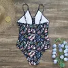 Kvinnors badkläder 2024 baddräkt snör upp etnisk stil sommar kvinnlig bikinis andningsbar monokini djup v hals sexig och strandkläder