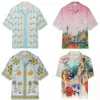 24SS CASA BULCA NOUVEAU créateur Silk Casual Shirt Men and Women Modèle d'été Print Imprimé Loissons Loose Verbe Hawaiian Short Shirt Casabulc Trendy Tops