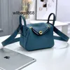 Femme sac à main L Linndies 2024 Nouvelle couche supérieure Cowhide Togo Le cuir 19cm mini sac de médecine en cuir crossbody Sac en cuir authentique