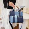 Designer Women's MC Tote Bag Denim Tote med fashionabla kontrasterande färg Patchwork Handväska Väskor stor kapacitet trendig en axel crossbody