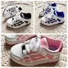 2023 designer skel top scarpe bassa scarpe per bambini ossa ciao cuoio da ragazzo girl sneakers