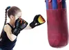 Luvas de boxe para crianças de engrenagem Treinamento de boxe Treinamento esportivo de couro confortável Luvas portáteis de luta portáteis atingindo equipamentos esportivos 240424