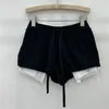 Shorts femininos shorts casuais atrelamento para mulheres 2024 Verão solta cintura alta cintura que corresponde a uma calça de moletom curta irregular que combina