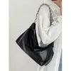Mjuk 2024 COWHide Chain Bag Womens Hand Grab Mönster Tote Single Shoulder Crossbody Large Capacity Lazy Style Pendlare