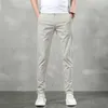 Pantalones de hombres pantalones casuales de verano para hombres delgados livianos livianos pantalones transpirables pantalones elásticos secos rápidos pantalones de chándal masculino d240425