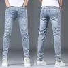 Luxe zomerontwerper Koreaanse klassieke streetwear cowboybroek voor mannen modieuze en comfortabele vriendje skinny jeans 240417