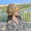 Szerokie brzegowe czapki wiadra czapki letnie kobietę wielki łuk hat przenośne składane wakacje plażowe okładka ręcznie tkana solidna kolor sunshade hat c j240425