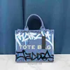 Designer Women's Mac Tote Bag Womens 2024 Ny utländsk stil Graffiti Bag Summer Trend Creative Messenger Shoulder