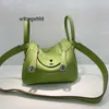 Femme sac à main L Linndies 2024 Nouveau mini mini Togo Pilandy Band Band Cow Hide Doctor Sac Fashion Womens One épaule Bag du corps