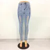 Les jeans pour femmes lacets vers le haut Ripped Ladies hautes hauts minces pantalons de crayon élastique