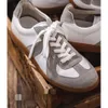 Chaussures d'entraînement allemandes de printemps, chaussures pour hommes et femmes, chaussures de planche basse, chaussures décontractées, cuir de petites chaussures blanches surélevées en cuir, chaussures de sport