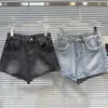 Shorts femminile 2024 Summer Rhinestone Pocket Edge Drill Washing Gradient Three Points Denim per Women Street Black Jean