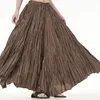 Kjolar mode kvinnor vikta trasiga veckade kjol elastiska midja fast färg golvlängd bubbla puffy lös passform en linje