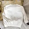Maglie da donna 2024 primavera/estate sottile 3d fiore bianco 5/4 manica a maglia maglietta camicia corta in stile francese miu cardigan