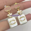 Orecchini designer di fascia alta per lettere per lettere per lettere 925 Materiale in rame argento marchio Uomini Donne Crystal Pearl Ear Diamond Earring Gioielli per la festa di nozze