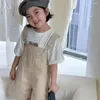 ショートパンツの子供服の子供カジュアルパンツ2024夏のファッショナブルな韓国スタイルオーバーオンコットンソリッドカラー