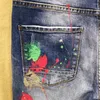 Jeans pour hommes graffiti la mode peinture en aérosol de trou de trou de trou de trou de la personnalité hip-hop streetwear masculin slim