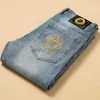 Designer Jeans for Mens Step into special men's jeans small feet slim fitting cotton new summer jeans man brand Medusa Fashion pants