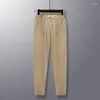 Pantalon pour hommes printemps été solide élastique haute taille de taille ferme à la fermeture à la glissière