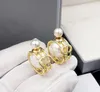 Brincos de pérolas de grife para mulheres de alta qualidade de luxo de luxo prateado cobre strass círculo de breol do lustre de breol de jóias de breol de jóias