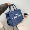 Designer Women's Mac Tote Bag Messenger Hand HET THE WOMENS Nuova lettera di spalla Small Square Simple Leisure Fashi