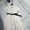 Sukienka damska designerska spódnica Kobiety z krótkim rękawem francuska szczupła plisowana spódnica bez talii koszulka klapiowa sukienki czarno-białe