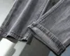 Francuskie szary mężczyźni rozciągnij szczupłe jeansy wiosna letnie cienki styl luksusowe marki Mid talii spodnie bawełniane i spandex na zewnątrz