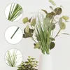 Dekorativa blommor 12 PC: er konstgjorda buskväxter simulerade prop inomhus simulering dekor hem gräsmodell imitation utsmyckning hushåll