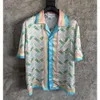 24SS CASA BULCA NOUVEAU créateur Silk Casual Shirt Men and Women Modèle d'été Print Imprimé Loissons Loose Verbe Hawaiian Short Shirt Casabulc Trendy Tops