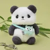 Animaux en peluche en peluche 11cm Panda Créatif Toy en peluche Keychain mignon Panda Poupée farcie Pendant Décoration Poldante Doll Doll Doll Toy for Kids