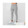 Herrenhosenstil Alphalete Marke Jogger Jogginghose Man Fitnessstudios Workout Fitness Baumwollhosen Männliche lässige Mode Spur Deli OTR5N