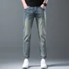 Mens Jeans Designer Nine point pants spring and autumn trendy brand high-end embroidered flower elastic jeans men's trendy brand small foot gray slim fit pants