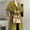 Trench Coats Femme Coat à lacets à double poitrine simple 2024 Spring Automne Spring Wild Elegant Long Breaker Extérieur