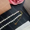 Luxury Women Pearl Collace Designer Diamond Bracelets para mulheres de alta qualidade Conjunto de jóias de ouro Classic Wedding Jewelry Ladies Anniversary Presente