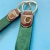 Diseñador de bolsas de mujer llavero para hombre llave de automóvil anillo rojo verde color mixto Regalos delicados regalos para amantes llavero de cuero de lujo estilo europeo distintivo