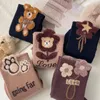 Chaussettes de femmes mode rétro rétro polyvalent mignon caricaturé en peluche de chaussettes d'ours confortable